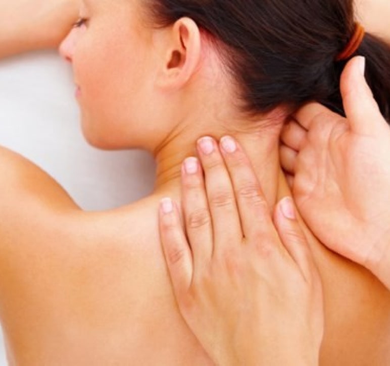 Womans neck being massaged